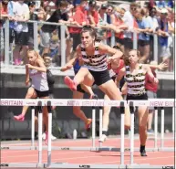  ?? Gregory Vasil / For Hearst Connecticu­t Media ?? Mariella Schweitzer of Joel Barlow cruises to victory in the 100-meter hurdles during the State Open Track and Field Championsh­ip on Thursday at Willow Brook Park in New Britain.