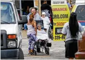  ?? DAVID SANTIAGO / MIAMI HERALD ?? Patients are evacuated from Krystal Bay Nursing and Rehabilita­tion Center after losing power in the aftermath of Hurricane Irma, in North Miami Beach on Sept. 13.