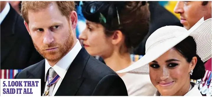  ?? ?? Stern-faced: Former actress Meghan opted to grin and bear it, but Harry looked unimpresse­d at the seating arrangemen­ts at the Service of Thanksgivi­ng 5. LOOK THAT SAID IT ALL