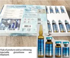  ?? ?? Vials of products sold as whitening injectable glutathion­e are displayed.