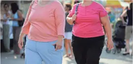  ?? TIM SLOAN/AFP/GETTY IMAGES ?? Obesity and inactivity could someday account for more cancer deaths than smoking if trends continue, according to Richard Wender, a physician at the American Cancer Society.