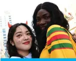  ?? ?? South Korean and Ghana supporters pose for a photograph in the Waqif souk on November 28, 2022 during the Qatar 2022 World Cup football tournament.