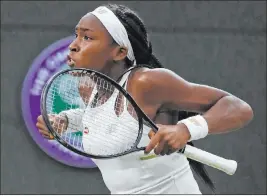  ?? Alastair Grant The Associated Press ?? American Coco Gauff is pumped after beating Slovakia’s Magdalena Rybarikova 6-3, 6-3 in the second round of Wimbledon on Wednesday night.