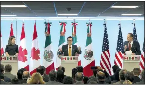  ?? AP/MARCO UGARTE ?? Canadian Foreign Affairs Minister Chrystia Freeland (from left), Mexico’s Secretary of Economy Ildefonso Guajardo Villarreal and U.S. trade representa­tive Robert Lighthizer speak Monday in Mexico City during a joint news conference regarding the...