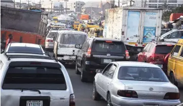  ??  ?? People trekking home at Eko bridge due to the partial closure of Third Mainland bridge in Lagos