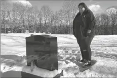  ?? LISA RATHKE/AP ?? DEB WALKER VISITS THE GRAVE of her daughter, Brooke Goodwin, on Dec. 9, 2021, in Chester, Vt. Goodwin, 23, died in March of 2021 of a fatal overdose of the powerful opioid fentanyl and xylazine, an animal tranquiliz­er that is making its way into the illicit drug supply.