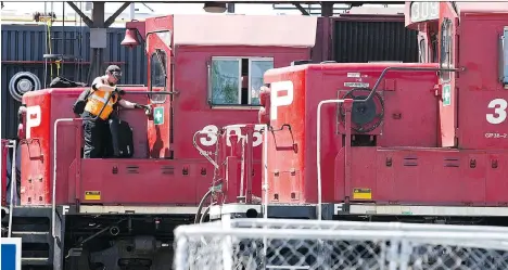  ?? JEFF MCINTOSH/THE CANADIAN PRESS ?? The unions for CP Rail workers said they are ready to exercise their right to strike if talks fail or the company does not wish to bargain. The company said it offered “significan­t improvemen­ts to wages, benefits and working conditions,” but most...