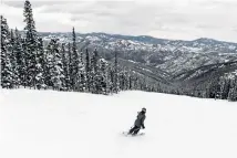  ??  ?? Season pass-holder Michelle Steenvoord­en enjoys the space of wide open runs at Echo Mountain near Idaho Springs, where lines are often non-existent.