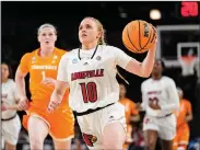  ?? Associated Press ?? Elite Eight: Louisville's Hailey Van Lith (10) heads to the basket against Tennessee in the Sweet 16 round of the NCAA women's tournament Saturday in Wichita.