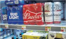  ?? DREW ANGERER
GETTY IMAGES ?? AB InBev has struggled to woo consumers back to its legacy lager brands, despite new innovation­s.