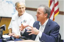  ?? Michael Ciaglo / Houston Chronicle ?? Texas A&M University System chancellor John Sharp, right, was handpicked by Gov. Greg Abbott to be the state’s storm recovery czar. The two were once neighbors.