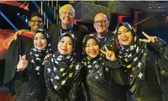  ??  ?? Yaashwin Sarawanan (left) with Malaysia’s girl group NAMA at the grand finals of Asia’s Got Talent Season 3.