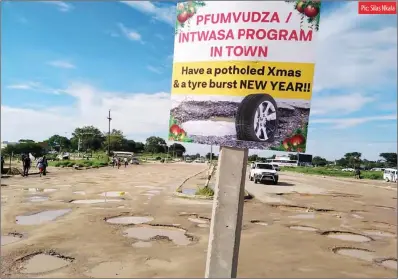  ??  ?? The state of Emakhanden­i Road in Bulawayo being lampooned through a Pfumvudza/Intwasa advert
Pic: Silas Nkala