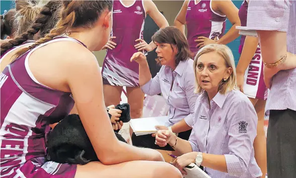  ?? Photo: Queensland Firebird ?? Jenny Brazel (right) during her days as assistant coach of the Queensland Firebirds.