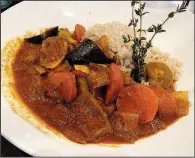  ?? Arkansas Democrat-Gazette/JENNIFER NIXON ?? Clinton’s Curry is the vegetarian option on the 42 Bar and Table dinner menu.