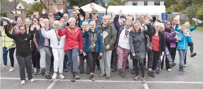  ?? ?? Walkers were joined at the start by MP Theresa May, the Mayor Cllr Christine Bateson and Rotary district governor Marius Hopely.