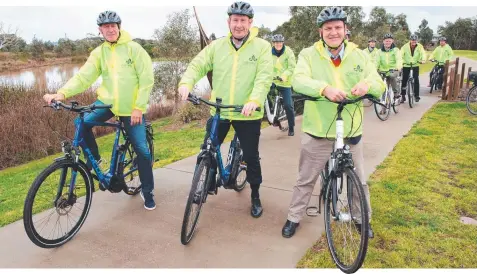  ?? Picture: ALAN BARBER ?? ON YOUR BIKE: Geelong Mayor Bruce Hardwood, Warralily director Mark Casey and South Barwon MP Darren Cheeseman riding the pathway.