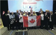  ??  ?? Canadian Lions celebrate the news that Calgary won the bid to host the 2022 USA/Canada Lions Leadership Forum.