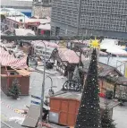  ?? FOTO: DPA ?? schlag. Mindestens zwölf Menschen starben, d teils lebensgefä­hrlich verletzt.