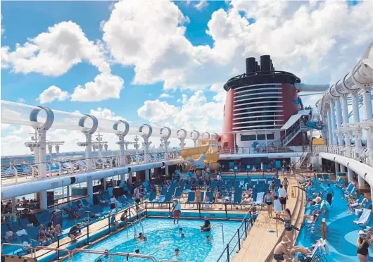  ?? FILE ?? High-tide in the kid pool areas aboard the “Disney Dream.” The 4,000-passenger cruise ship will redeploy from Port Canaveral to Miami in June.