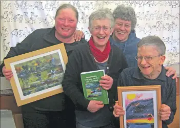  ??  ?? Hilary Patrick presents Fiona Rutherford and Nigel Hunter with a copy of her book.