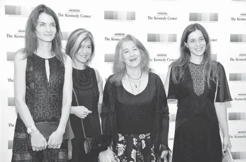  ??  ?? 2016 Kennedy Centre Honoree Argentine-born pianist Martha Argerich (second right) and her daughters Anne Catherine Dutoit (left), Lyda Chen (second left) and Stephanie Argerich pose for photograph­ers as they arrive for a gala dinner at the US State...