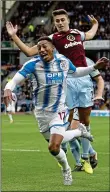  ??  ?? DIVE: Van La Parra tries to win a penalty against Matt Lowton