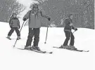  ?? STEVE SZYDLOWSKI/THE PROVIDENCE JOURNAL, FILE ?? Brian Zahm, an instructor at Yawgoo Valley Ski Area, and his students head down the slope in 2019.