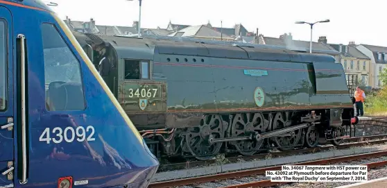  ??  ?? No. 34067 Tangmere with HST power car No. 43092 at Plymouth before departure for Par
with ‘The Royal Duchy’ on September 7, 2014.