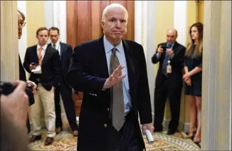  ?? ANDREW HARNIK / ASSOCIATED PRESS ?? Sen. John McCain, R-Ariz., arrives for a Senate Republican meeting in June on a health care reform bill on Capitol Hill in Washington. McCain has been diagnosed with a brain tumor after doctors removed a blood clot above his left eye last week, his...
