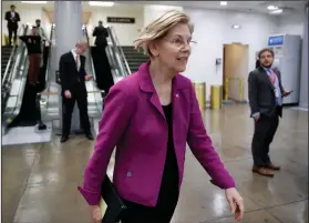  ?? AP Photo/Alex Brandon ?? Vote: Sen. Elizabeth Warren, D-Mass., departs after a vote on Gina Haspel to be CIA director, on Capitol Hill, Thursday in Washington. The Senate confirmed Haspel as the first female director of the CIA following a difficult nomination process that...