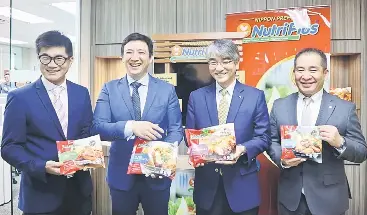  ??  ?? (From left) NHFM director Yap�������������������������������������� Chor Wen, Chor How, NHFM chief executive officer Ryuichi Nitta and Fujii p����������������������������������ose with variants of ‘Nip���������������������������p���������������on...