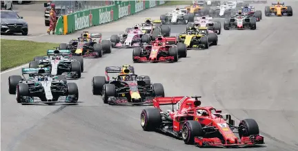  ?? ALLEN MCINNIS ?? Ferrari driver Sebastian Vettel leads the pack into the first turn at the Canadian Grand Prix Formula One in Montreal on Sunday.