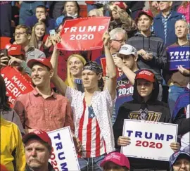  ?? Darren Hauck Getty Images ?? SUPPORTERS GREET President Trump at a rally Saturday in Green Bay, Wis. Trump has advantages as well as challenges that didn’t exist in his 2016 campaign.