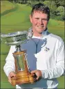  ??  ?? Robert pictured with the Scottish amateur golf trophy
