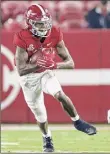  ?? Collegiate Images via Getty Images ?? Devonta Smith of Alabama caught 11 passes for 167 yards and two touchdowns in Saturday’s victory.