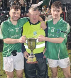  ?? (Pic: John Ahern) ?? PROUD MOMENT FOR THE HEGARTYS: Selector, Alan Hegarty, with his sons, Aaron and Sean following the county final in Páirc Uí Rinn.