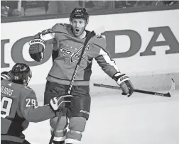  ?? NICK WASS/AP ?? Capitals defenseman Brooks Orpik celebrates his game-winning goal in overtime against the Hurricanes on Saturday.