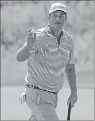  ?? Associated Press ?? Putnam qualifies: This June 15, 2017, file photo shows Michael Putnam reacting after making a putt on the third hole during the first round of the U.S. Open golf tournament at Erin Hills in Erin, Wis. Putnam thought about withdrawin­g from U.S. Open...