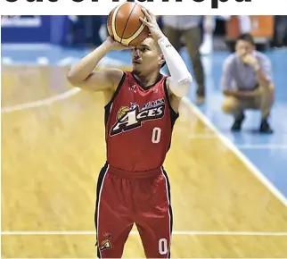  ?? ALVIN S. GO ?? GUARD SIMON ENCISO hit nine triples to help the Alaska Aces to a 125-96 win over TNT KaTropa on Sunday.