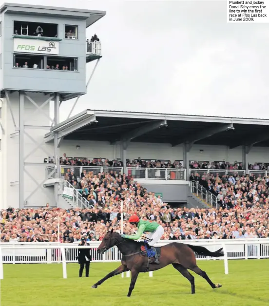  ??  ?? Plunkett and jockey Donal Fahy cross the line to win the first race at Ffos Las back in June 2009.