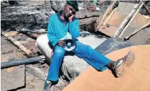  ??  ?? THULANI DUMA complained that he was only left with a bed after his shack was demolished.