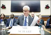  ??  ?? In this file photo, Wells Fargo CEO and President Charles Scharf is seated before he testifies during a hearing of the House Financial Services Committee, on Capitol Hill, in Washington. (AP)