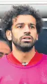  ??  ?? Mo Salah suffers on the sidelines yesterday