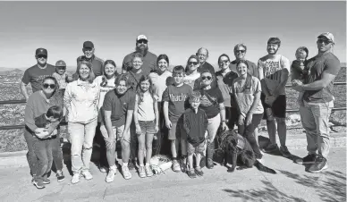  ?? BILL GOODYKOONT­Z/THE REPUBLIC ?? Bill Goodykoont­z and his extended family at South Mountain Park and Preserve in Phoenix.