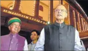  ?? PTI ?? Finance Minister Arun Jaitley with MoS Arjunram Meghwal leaves after the launch of GST on Saturday.