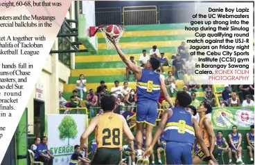  ?? RONEX TOLIN PHOTOGRAPH­Y ?? Danie Boy Lapiz of the UC Webmasters goes up strong into the hoop during their Sinulog Cup qualifying round match against the USJ-R Jaguars on Friday night at the Cebu City Sports Institute (CCSI) gym in Barangay Sawang Calero.