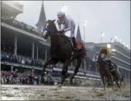  ?? MORRY GASH — THE ASSOCIATED PRESS ?? Kentucky Derby champion Justify is the 1-2 morning-line favorite for Saturday’s Preakness Stakes.