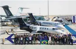  ??  ?? Embraer Praetor 500 and Phenom 300E on static display