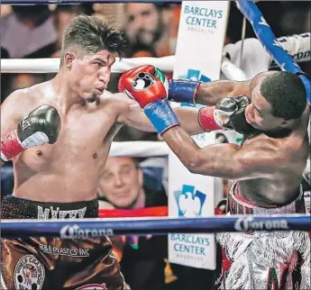  ?? Anthony Geathers Getty Images ?? MIKEY GARCIA beat Adrien Broner last July in Brooklyn, where he also fought the summer before. Now the Oxnard native gets his first main event at Staples Center in a lightweigh­t belt unificatio­n bout.